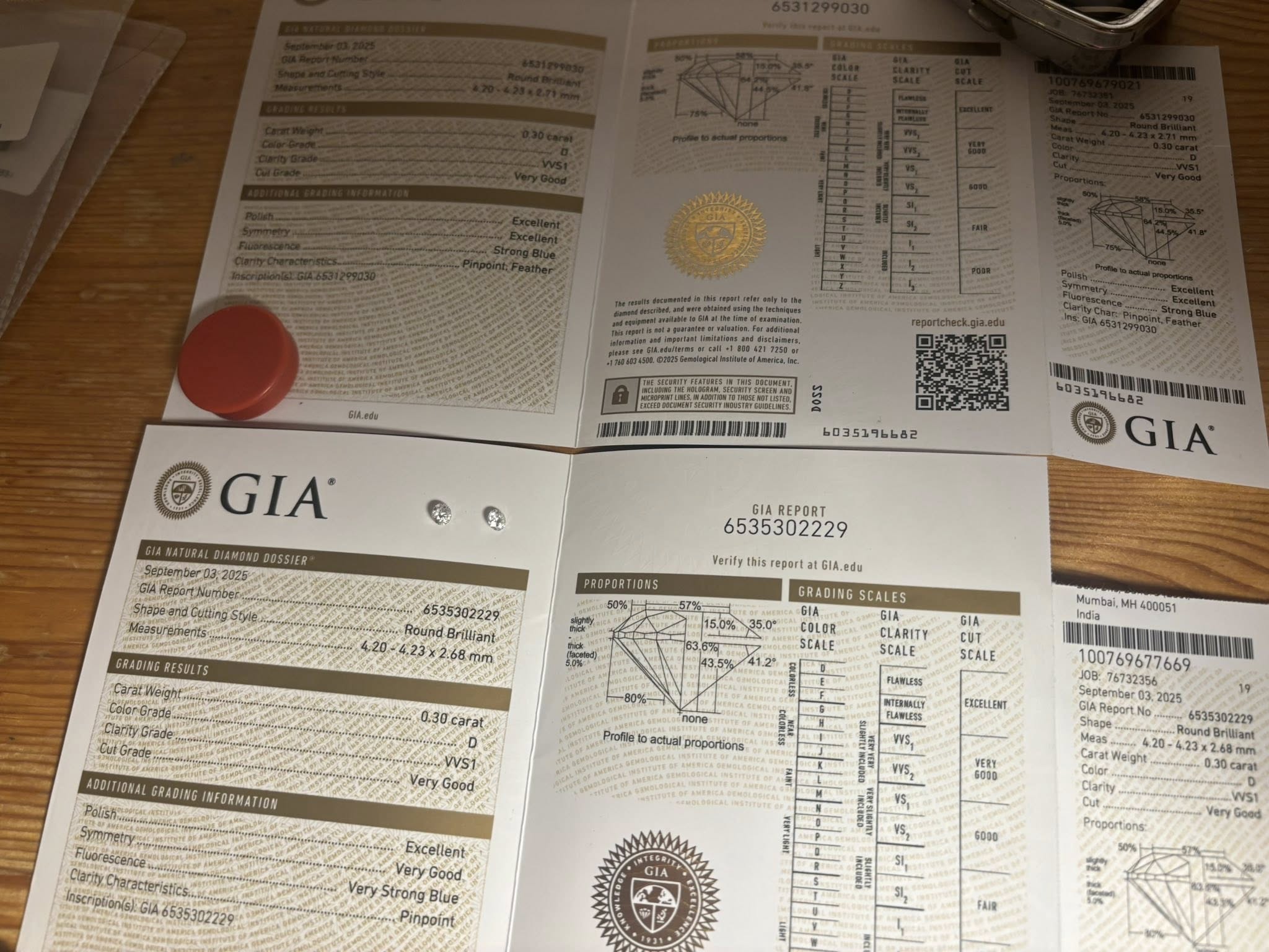 Matching Pair Natural Diamonds – 0.60 ct Total (0.30 ct Each) – Round Brilliant – D / VVS1 – GIA Certified & Laser Inscribed